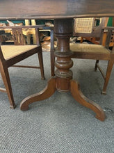 Load image into Gallery viewer, table - round - carved pillar leg - antique teakwood (26256) - 42.5&quot; dia x 31&quot;H
