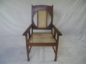 chair - rattan seat & back with arms - two 1/2 moon cutout at back - 25x26x41"H