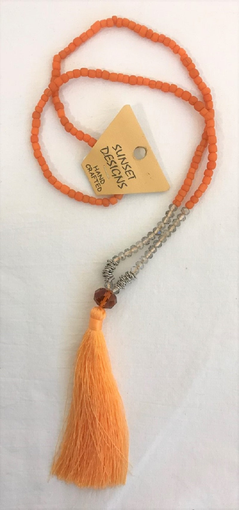 necklace - orange - crystal beads clear & metal ring beads - orange bead & tassle