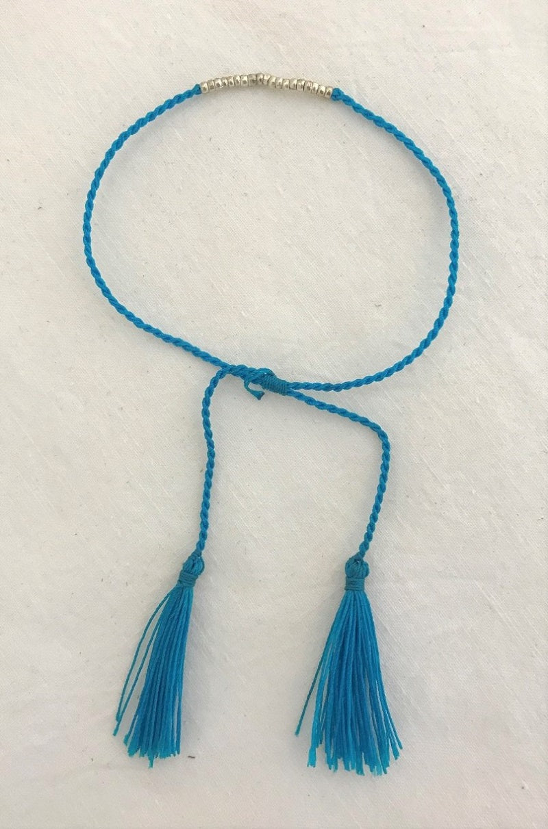 bracelet - tuquoise - string cotton w/ silver bead