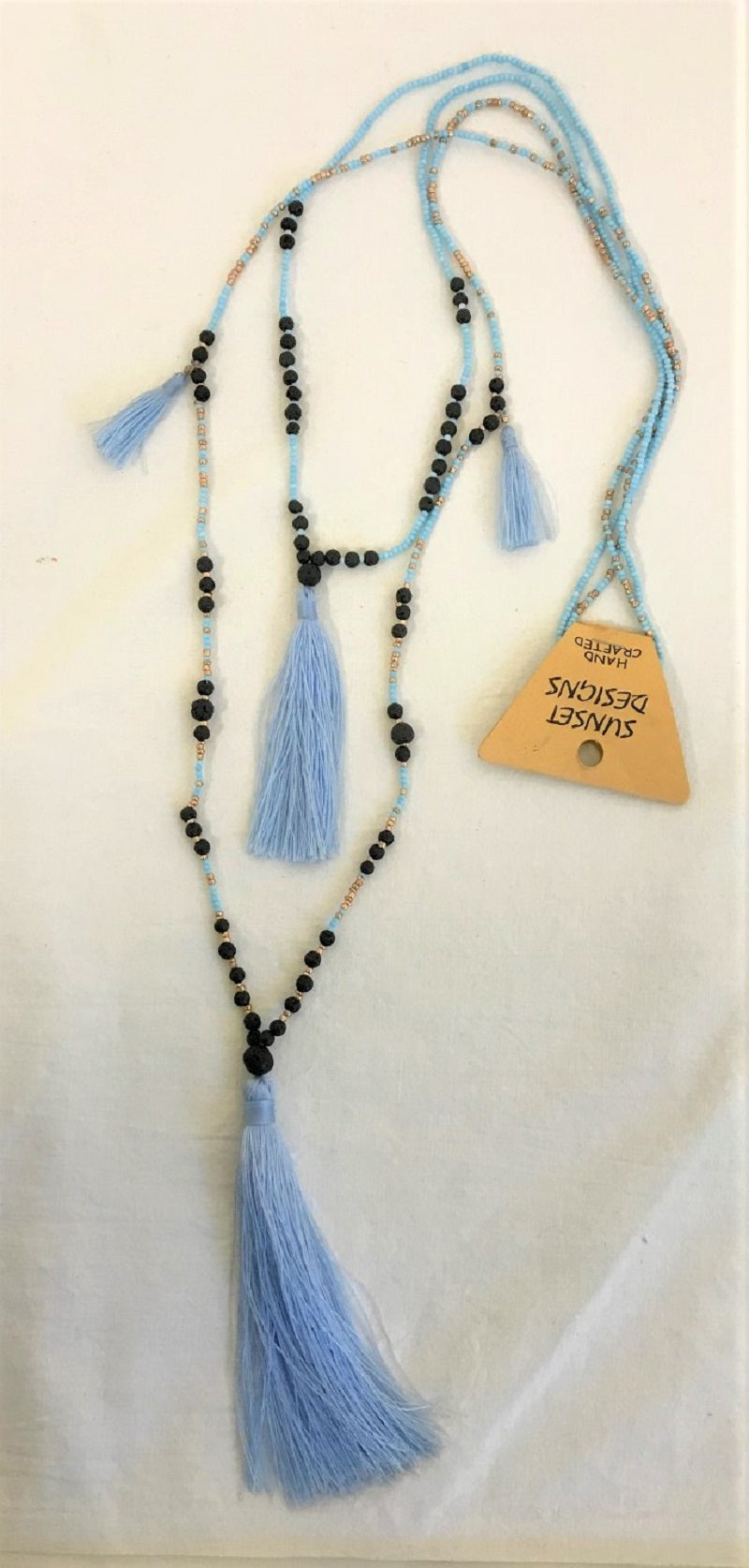 necklace - long w/ lava stone - light blue - w/ tassle